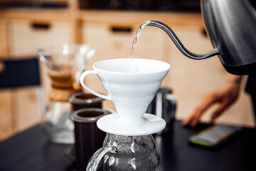 Alternative method of making coffee, funnel drip glasses with paper filter pour over kettle with hot water