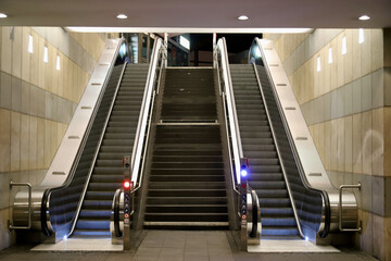 abandoned escalator downtown at night