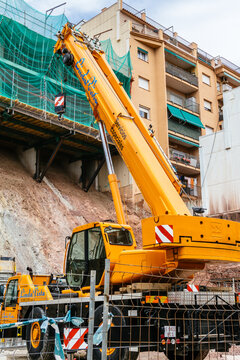 Barcelona, Spain - May 16, 2021. Mobile crane in an apartment construction