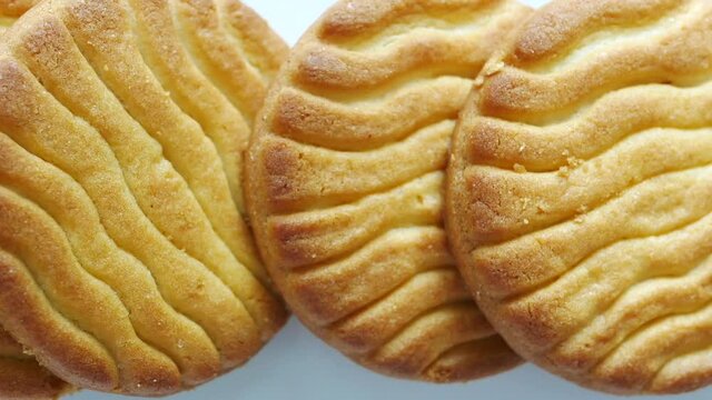 close up of sweet cookies on wooden table 