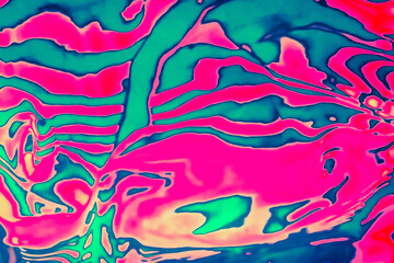 Abstract trendy neon colored psychedelic fluorescent striped zebra color waves textured neon background. 1960s Style Color Waves backdrop