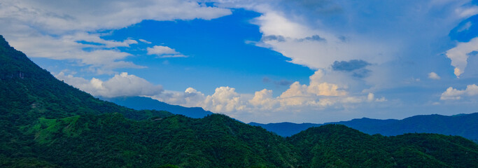 Fototapeta na wymiar beautiful landscape nature of rain forest and mountain background. tropical forest of thailand.