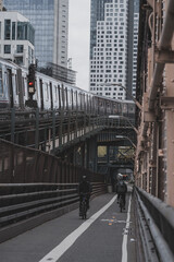 train in the city people bike Manhattan New York  