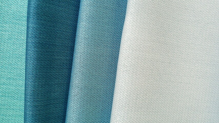 close up fabric organza texture in light blue and cyan color. close up woolen fabric for interior...
