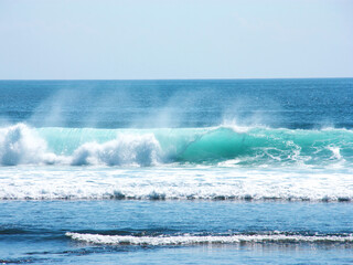 The picturesque view of the wave in the Indian ocean. The beautiful travel background. The concept of the nature power and escape from civilisation.