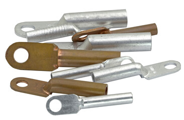 Electric terminals of different size on white