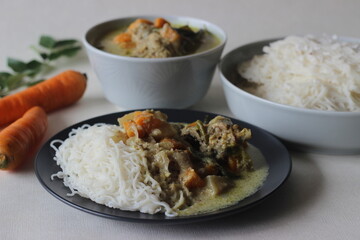 String hoppers, a steamed rice noodle dish served with stewed chicken.