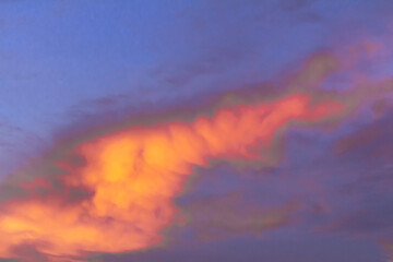 Fototapeta na wymiar Colorful dramatic sky at sunset with layered rain clouds late at night