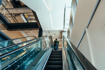 Modern luxury escalators at shopping mall in New York City, USA