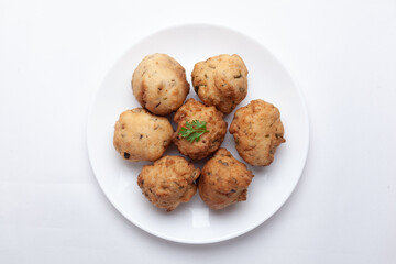 Plain dry dahi badhe for preparation of chaat, Garnished with cumin and green fresh coriander