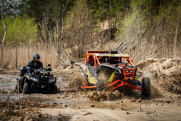 Cool view on two Quad rides fast on dirt, quad racing, ATV 4x4.