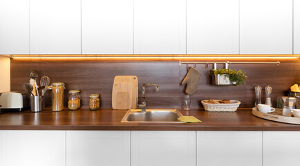 Modern bright kitchen in Art Nouveau style, in a clean interior.