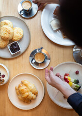 Woman holding brochette 