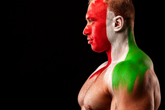 Italy fan. Soccer or football athlete with flag bodyart on face. Sport concept with copyspace. - Powered by Adobe