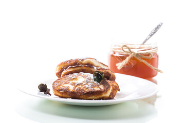 sweet fried cottage cheese pancakes in a plate