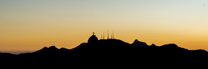 landscape of rio de janeiro in late afternoon, yellow sky
