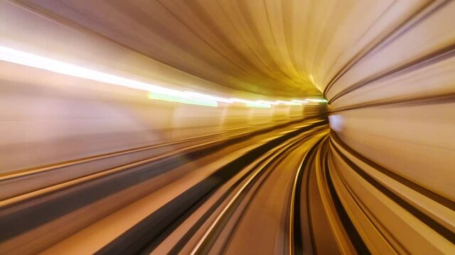 Copenhagen, Denmark. Riding the metro in Copenhagen, Denmark. Time-lapse of motion blurred tube lines in tunnel