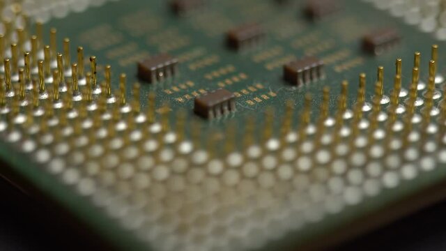 Used cpu close-up, broken computer processor with bent pins