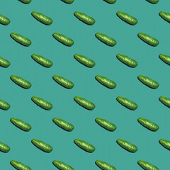 Seamless texture background pattern of fresh green cucumbers on a colored background.