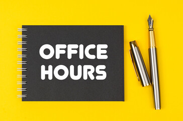 On a yellow background lies a pen and a black notebook with the inscription - Office Hours