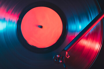 Close up of turntable play vinyl record at night club