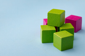 Obraz premium Wooden toy building kit details on blue background