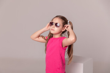 beautiful girl in sunglasses. advertising children's glasses