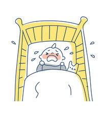 ベビーベッドの中で泣く赤ちゃん