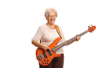 Elderly woman with an electric bass guitar smiling at the camera