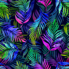 Tropical watercolor pattern with saturated colored palm leaves