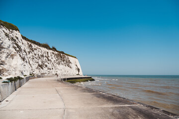 Dumpton Gap bay with colourful wooden beach huts between Broadstairs and Ramsgate