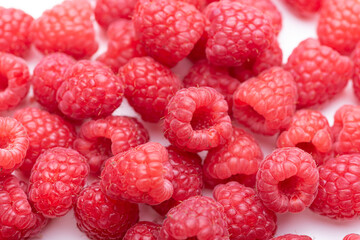 Raspberry berries on a white background