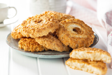 Sweet coconut cookies. Tasty biscuits with coconut flavor.