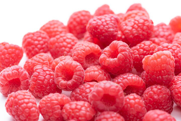 Raspberry berries on a white background