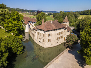 Fototapeta na wymiar The Hallwyl Castle (founded in the late 12th century) in Canton Aargau. Located on two islands in the River AabachIt, it is one of the most important moated castles in Switzerland.