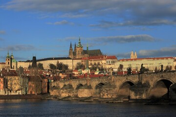 Panoramic view to the Charles Bridge with 
Vitus Cathedral and castle district.