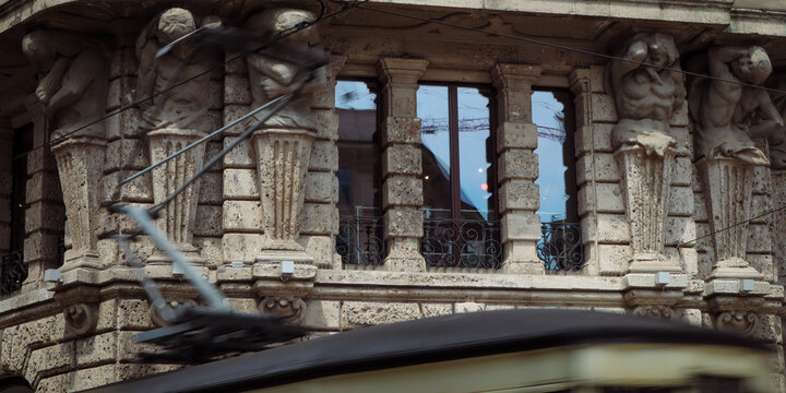 Detail of the facade of a building in via dante, milano