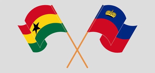 Crossed and waving flags of Ghana and Liechtenstein