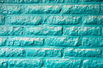 Turquoise or Auqua mint green brick wall background texture modern desing. Retro pastel colored abstract style