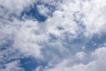 blue sky with white fluffy clouds