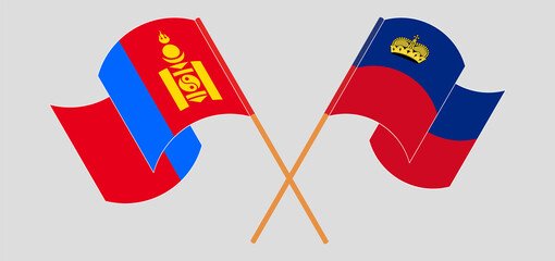 Crossed and waving flags of Mongolia and Liechtenstein