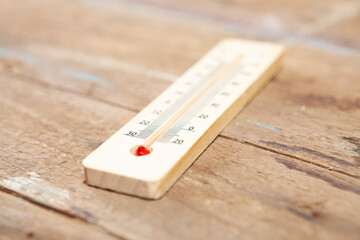 home thermometer on a wooden table