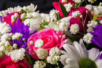Background for a greeting card - beautiful gift bouquet of various colorful decorative summer flowers