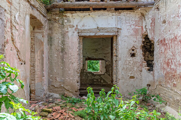 Fototapeta na wymiar Gunaros, Serbia - May 28, 2021: The abandoned summer house 
