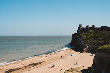 Kingsgate Castle on the top of the cliffs at the Kingsgate beach on sunny day