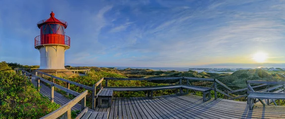Foto auf Acrylglas Panorama view of coastal landscape at North sea from orientation and vantage point, Isle Amrum,Schleswig-Holstein, Germany. Stunning view from Wadden Sea coastline with sandy beach.  © snapshotfreddy