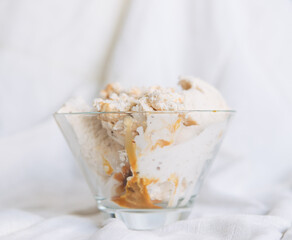 Vanilla ice cream with chocolate chip cookies, chocolate chips and caramel, strawberry or raspberry sauce.