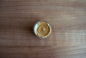 a glass of cold coffee with milk