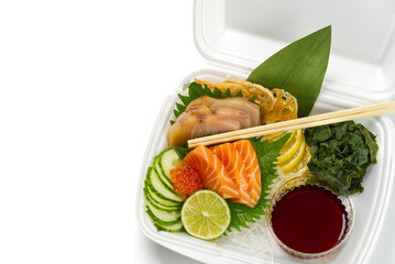 sashimi set, Japanese food. sushi restoran menu. Japanese seafood. sashimi set on plate with cucumber and salad. Takea way sashimi set.