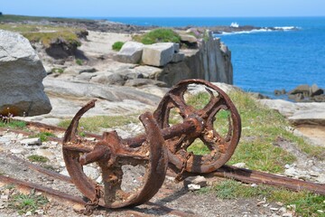old axle in iron for stones in granite quarrying at "Ile Grande" in Brittany. France